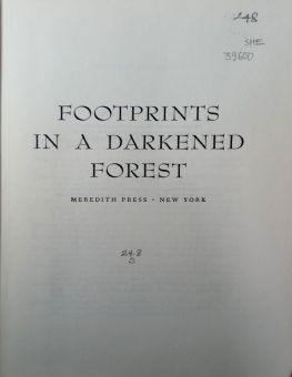 FOOTPRINTS IN A DARKENED FOREST